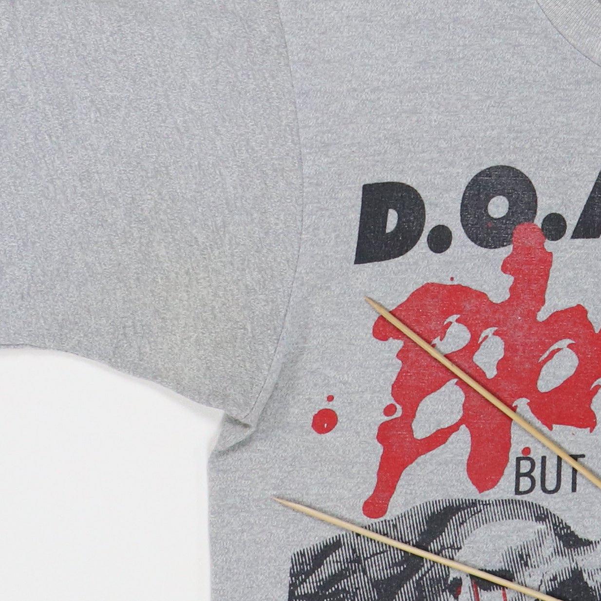 1984 DOA Bloodied But Unbowed Shirt