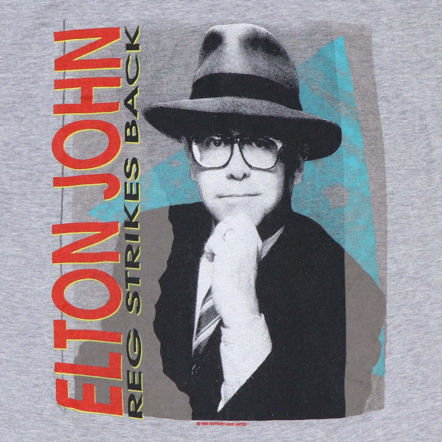 1985 Elton John Reg Strikes Back Shirt